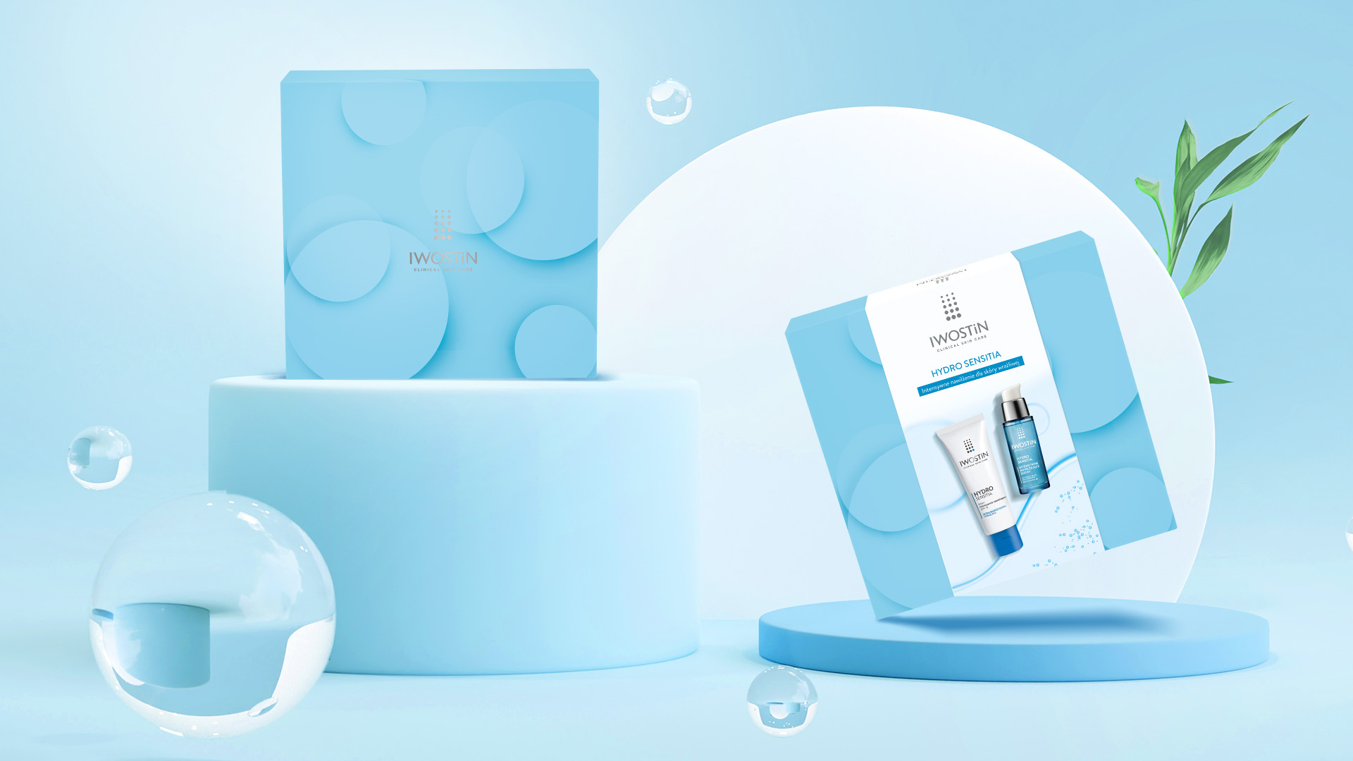 Iwostin opakowanie prezentowe - klimat tworzący design opakowania - niebieskie tło i elementy, krople wody oraz lekko unoszące sie opakowanie